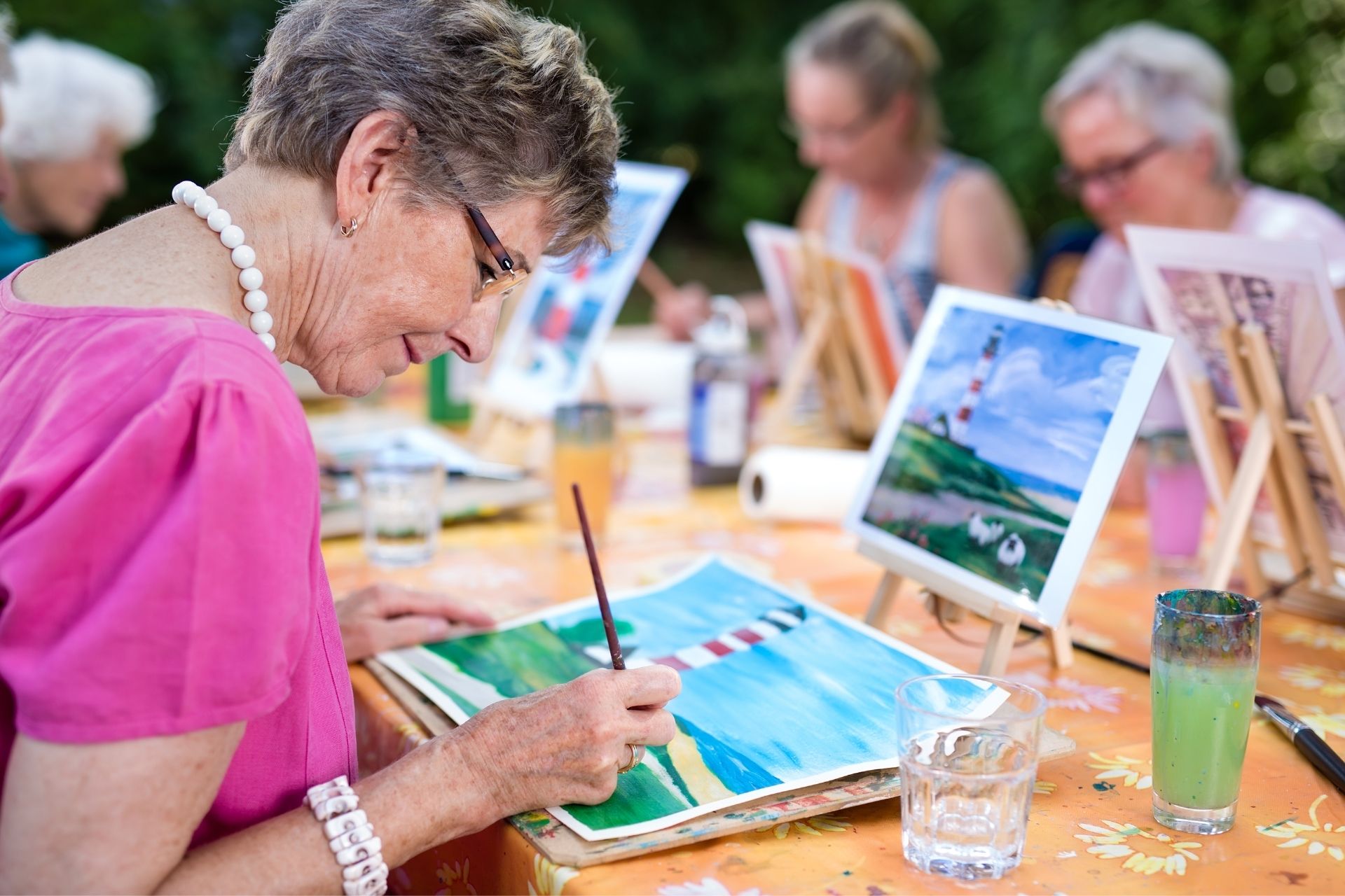 ladies painting together in a club