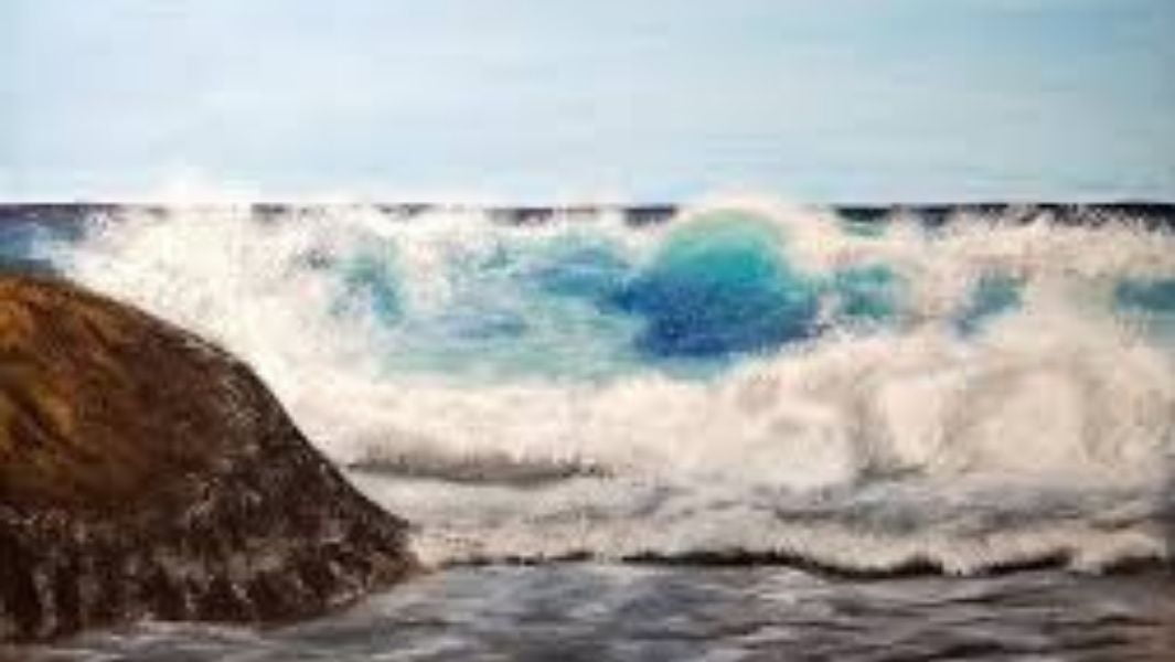 beach scene with rocks and waves